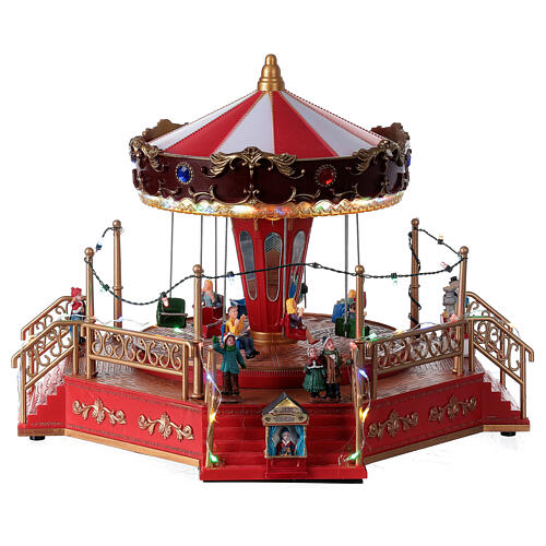 christmas swing carousel village lights