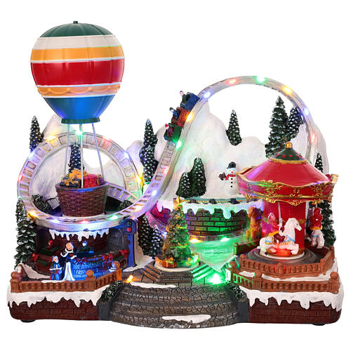 christmas village set amusement park with animations lights and music