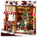 christmas village set santas shop with christmas tree in motion