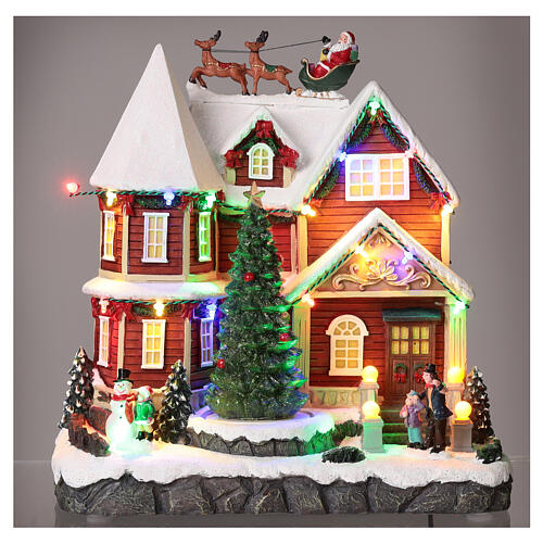 weihnachtsdorf-mit-haus-und-weihnachtsmann-25x25x20-cm