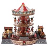 Village Noel eclaire carrousel en mouvement musique 35x40x35 cm courant