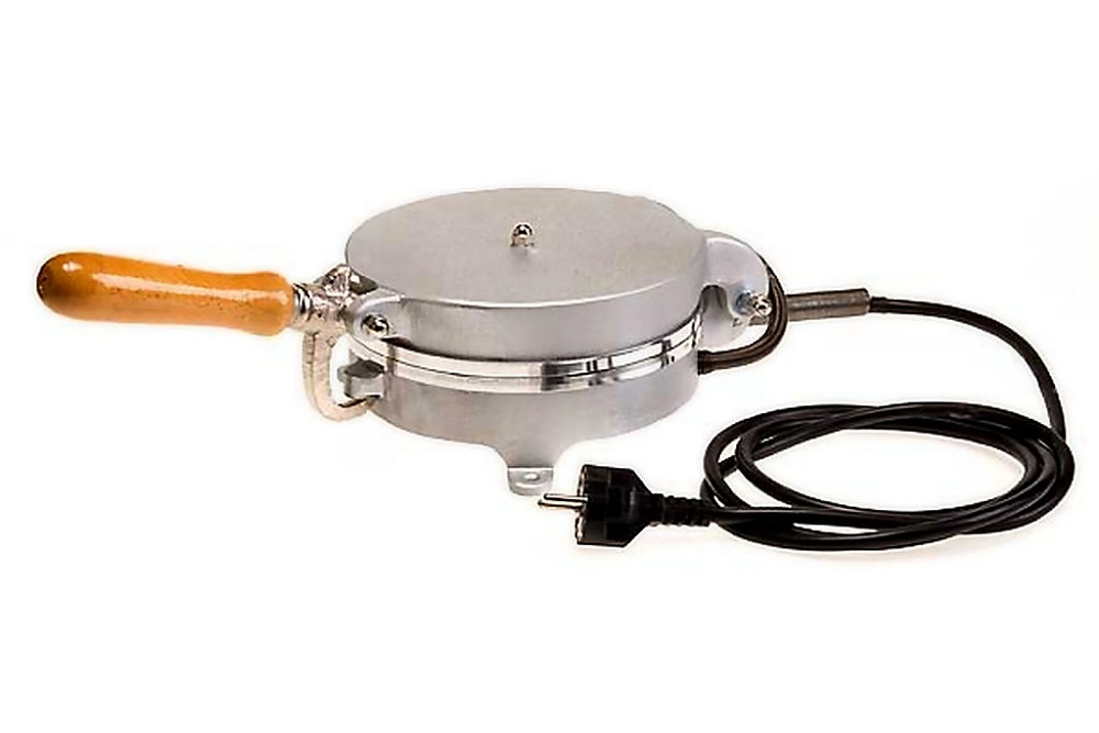 Stampi per ostie: una storia lunga quasi 2000 anni Macchina per ostie