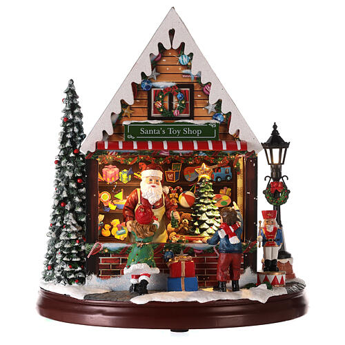 scenario negozio di giochi di babbo natale 25x25x15 cm