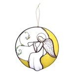 angelo con flauto sulla luna in vetro colorato