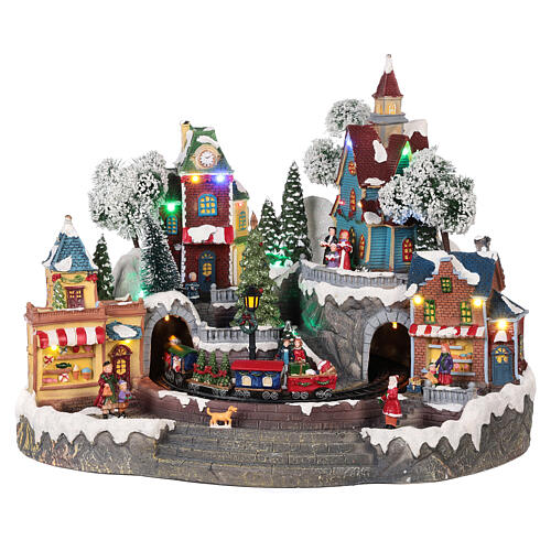 Miasteczko Bożonarodzeniowe pociąg i sklepy, ruch, oświetlenie, dźwięk 35x45x35 cm